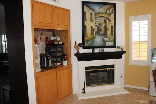 31256 Firestone St, Temecula, CA 92591 - bar area featuring a glass covered fireplace and light tile patterned flooring