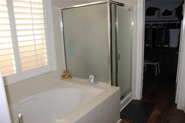 31256 Firestone St, Temecula, CA 92591 - bathroom with a shower stall, a garden tub, and a walk in closet