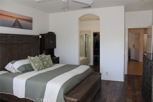 31256 Firestone St, Temecula, CA 92591 - bedroom with arched walkways, wood-type flooring, a ceiling fan, a walk in closet, and ensuite bath