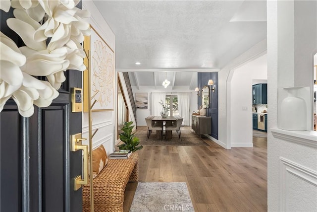 5825 Paseo De La Cumbre, Yorba Linda, CA 92887 - entrance foyer with wood finished floors, a textured ceiling, and arched walkways