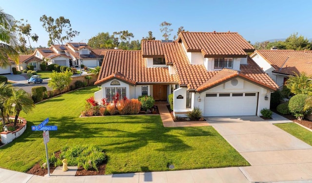 2044 Columbus Way, Vista, CA 92081 - mediterranean / spanish home with a tile roof, stucco siding, a garage, driveway, and a front yard