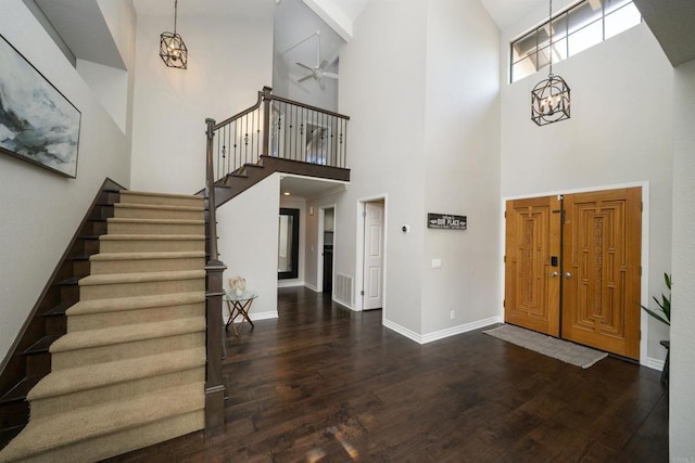 2044 Columbus Way, Vista, CA 92081 - foyer entrance with a high ceiling, a chandelier, stairway, wood finished floors, and ceiling fan