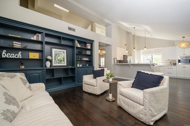 2044 Columbus Way, Vista, CA 92081 - living area featuring high vaulted ceiling and dark wood-style flooring