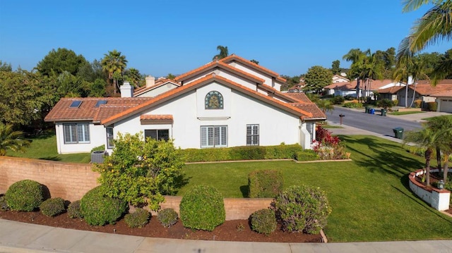 2044 Columbus Way, Vista, CA 92081 - rear view of property featuring stucco siding, a chimney, a yard, and a tile roof