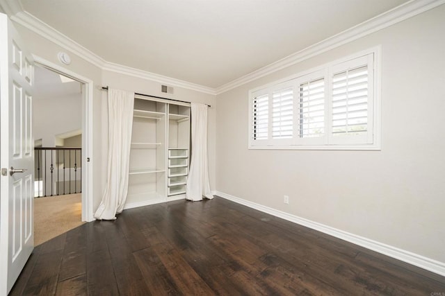 2044 Columbus Way, Vista, CA 92081 - unfurnished bedroom featuring dark wood-style floors, ornamental molding, and a closet