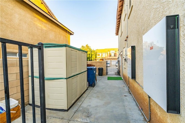 40209 Chelsea Ct, Palmdale, CA 93551 - view of home's exterior with stucco siding and a gate