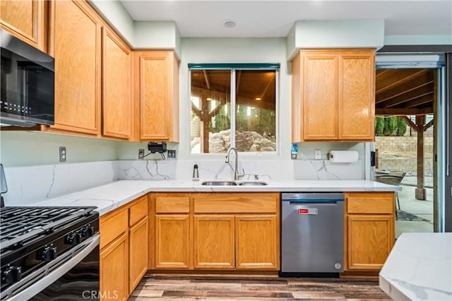40209 Chelsea Ct, Palmdale, CA 93551 - kitchen featuring stainless steel appliances, wood finished floors, and light stone countertops