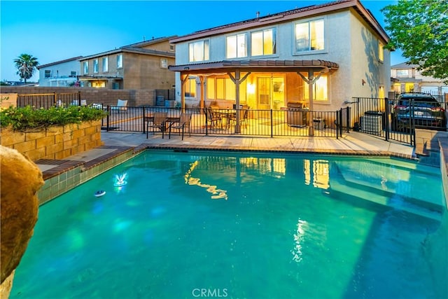 40209 Chelsea Ct, Palmdale, CA 93551 - back of property with a patio, a fenced backyard, and stucco siding