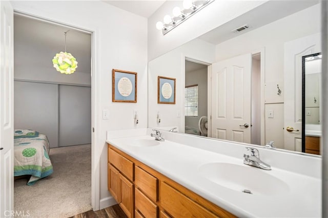40209 Chelsea Ct, Palmdale, CA 93551 - full bathroom with double vanity and connected bathroom