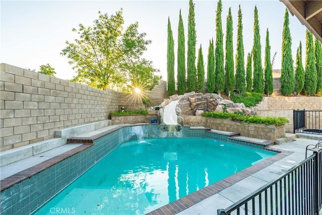 40209 Chelsea Ct, Palmdale, CA 93551 - view of pool with a water slide and a fenced backyard