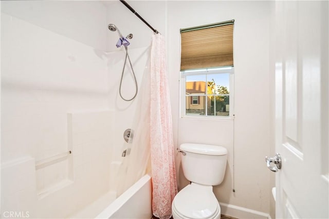 40209 Chelsea Ct, Palmdale, CA 93551 - bathroom with baseboards and shower / bath combo with shower curtain