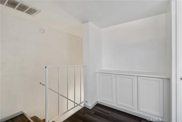 43606 Stanridge Ave, Lancaster, CA 93535 - empty room with dark wood finished floors and a smoke detector