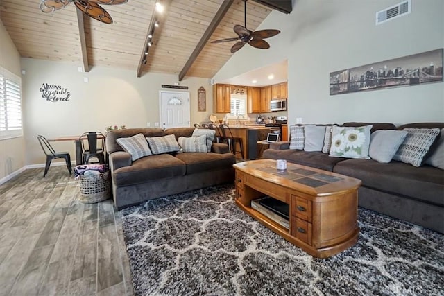 182 Darfo Dr, Crestline, CA 92325 - living area featuring wood ceiling, a ceiling fan, light wood finished floors, plenty of natural light, and rail lighting