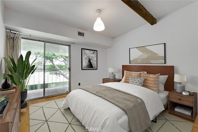 1701 Clinton St Unit 402, Los Angeles, CA 90026 - bedroom with access to outside, light wood finished floors, and beam ceiling