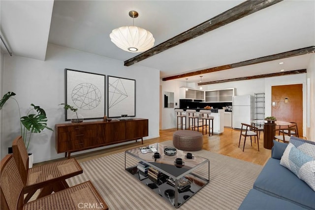 1701 Clinton St Unit 402, Los Angeles, CA 90026 - living room with wood finished floors and beamed ceiling