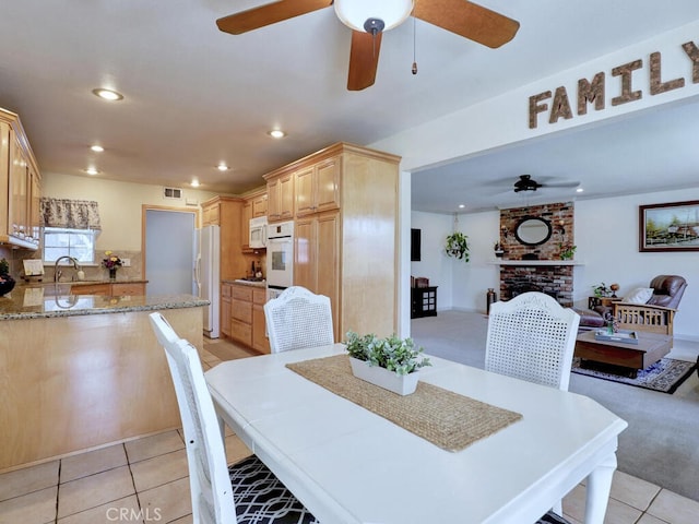 6364 Hancock Way, Buena Park, CA 90620 - dining area featuring ceiling fan, recessed lighting, light tile patterned flooring, and a fireplace