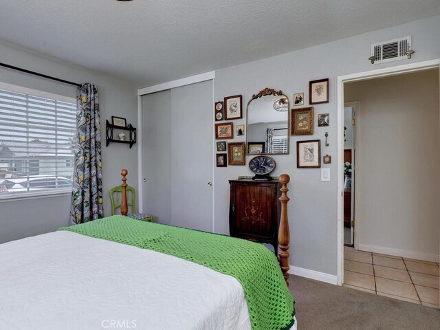 6364 Hancock Way, Buena Park, CA 90620 - tiled bedroom featuring a closet and carpet flooring