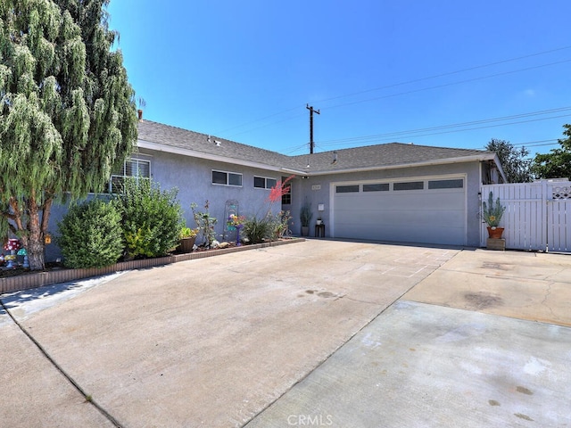 6364 Hancock Way, Buena Park, CA 90620 - single story home with stucco siding, an attached garage, concrete driveway, and roof with shingles