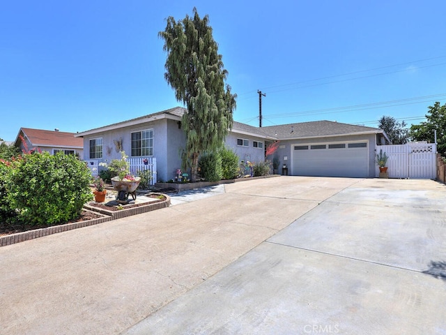 6364 Hancock Way, Buena Park, CA 90620 - ranch-style home with concrete driveway, stucco siding, and a garage