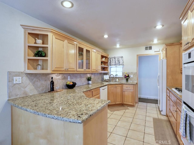 6364 Hancock Way, Buena Park, CA 90620 - kitchen featuring open shelves, white appliances, a peninsula, backsplash, and light stone counters
