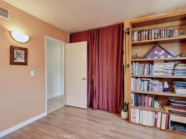 6364 Hancock Way, Buena Park, CA 90620 - sitting room with wood finished floors and baseboards