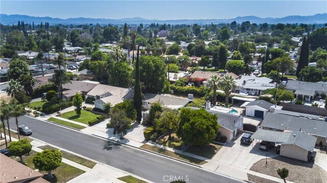 8527 Casaba Ave, Winnetka, CA 91306 - aerial perspective of suburban area with a mountain backdrop