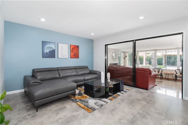 8527 Casaba Ave, Winnetka, CA 91306 - living room featuring recessed lighting and baseboards