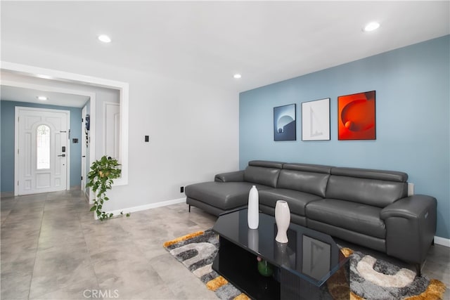 8527 Casaba Ave, Winnetka, CA 91306 - living area featuring recessed lighting and concrete flooring