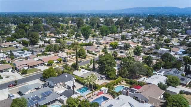 8527 Casaba Ave, Winnetka, CA 91306 - aerial perspective of suburban area featuring a pool