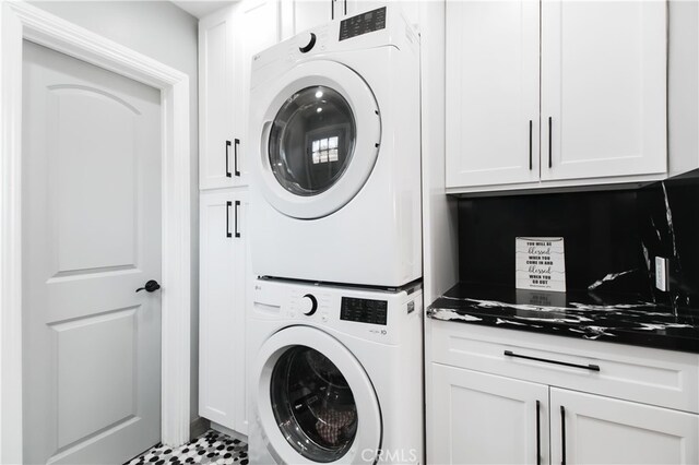8527 Casaba Ave, Winnetka, CA 91306 - laundry area with estacked washer and dryer and cabinet space