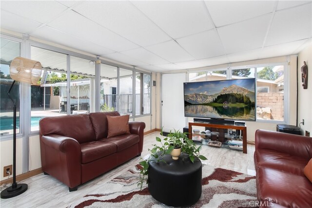 8527 Casaba Ave, Winnetka, CA 91306 - living room with a drop ceiling and plenty of natural light