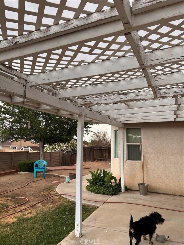 14106 Dartmouth St, Hesperia, CA 92344 - fenced backyard featuring a pergola and a patio area