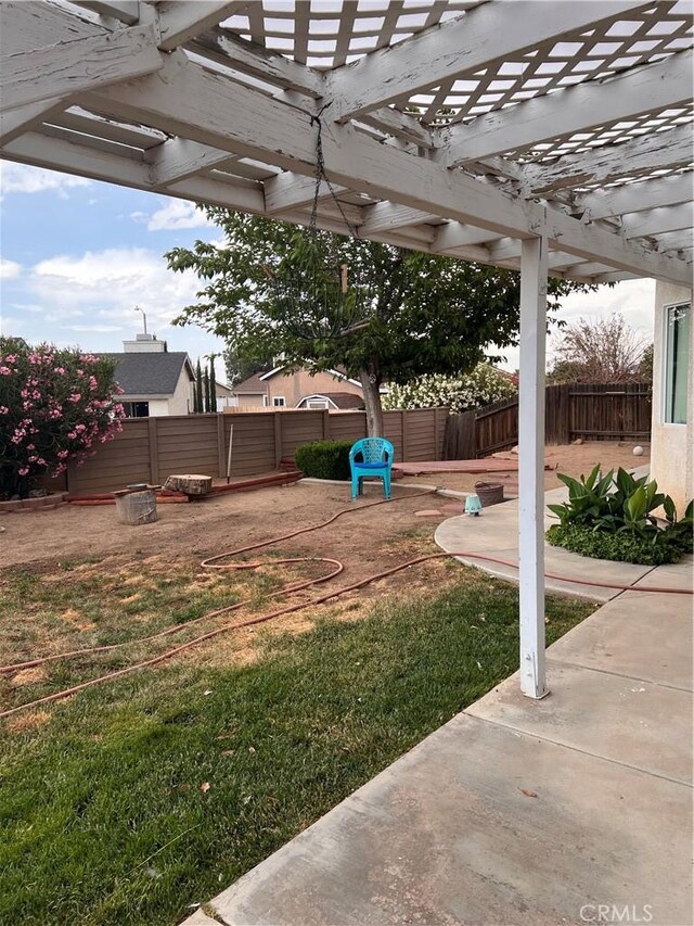 14106 Dartmouth St, Hesperia, CA 92344 - fenced backyard featuring a patio area and a pergola
