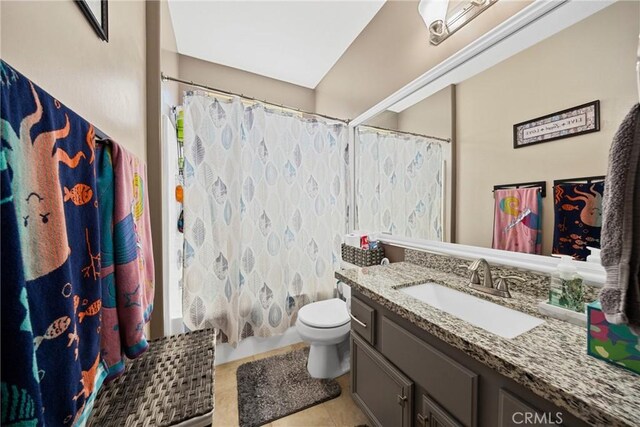 1410 Charles St, Banning, CA 92220 - bathroom with vanity and tile patterned flooring