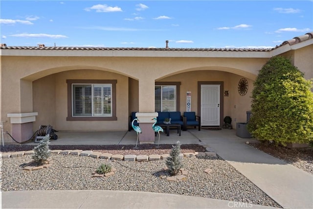 1410 Charles St, Banning, CA 92220 - entrance to property with stucco siding and a porch