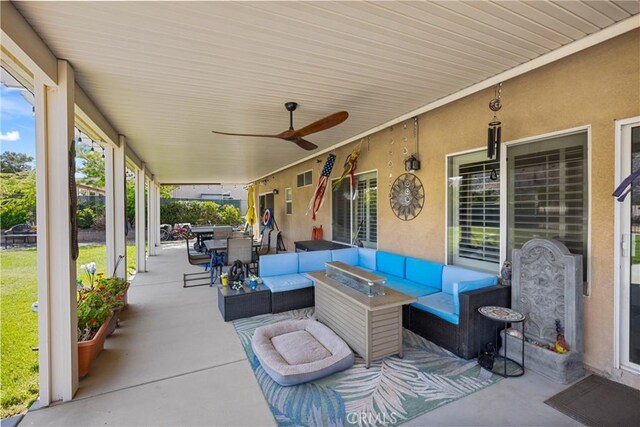 1410 Charles St, Banning, CA 92220 - view of patio featuring an outdoor hangout area, outdoor dining space, and a ceiling fan