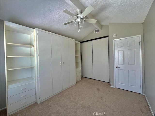 2014 W Hartford Pl Unit 58, Anaheim, CA 92801 - unfurnished bedroom with a textured ceiling, light colored carpet, and ceiling fan