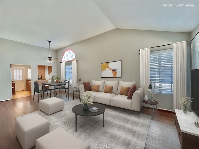 2014 W Hartford Pl Unit 58, Anaheim, CA 92801 - living area featuring lofted ceiling, wood finished floors, and ceiling fan
