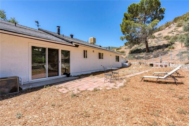 26865 Pine Canyon Rd, Lake Hughes, CA 93532 - back of property featuring a patio area and a mountain view