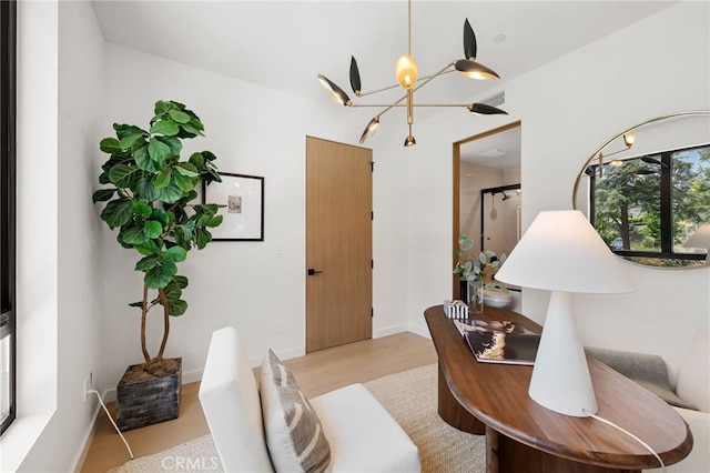 555 N Plymouth Blvd, Hancock Park, CA 90004 - office with a chandelier and light wood-style flooring