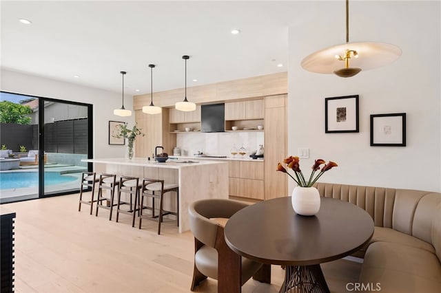 555 N Plymouth Blvd, Hancock Park, CA 90004 - dining room featuring recessed lighting and light wood-style flooring