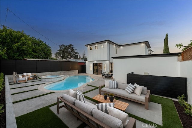 555 N Plymouth Blvd, Hancock Park, CA 90004 - view of pool with an outdoor living space, a patio, a fenced backyard, and an in-ground hot tub