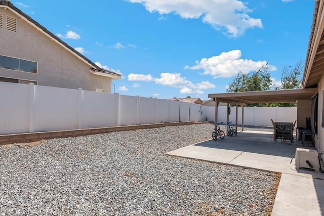 14389 Northstar Ave, Victorville, CA 92392 - fenced backyard featuring a patio