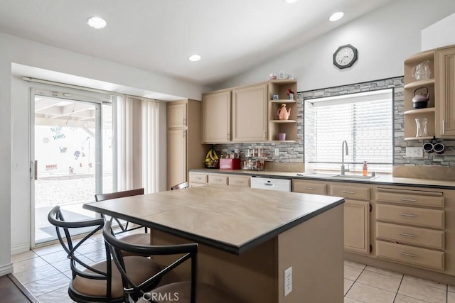 14389 Northstar Ave, Victorville, CA 92392 - kitchen featuring open shelves, backsplash, vaulted ceiling, light tile patterned flooring, and a center island