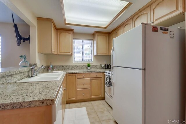 2917 C St Unit 186, San Diego, CA 92102 - kitchen featuring white appliances, light brown cabinets, light countertops, and light tile patterned floors