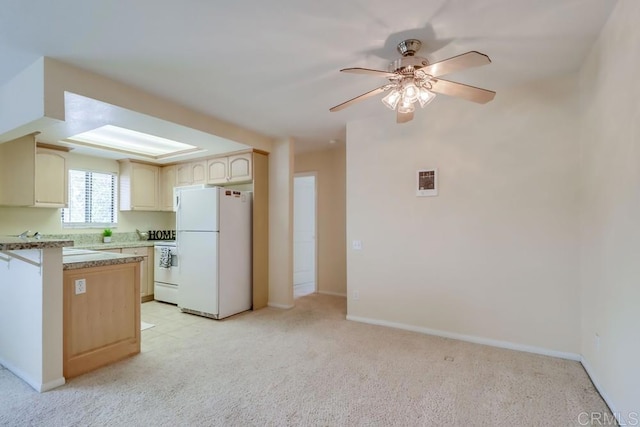 2917 C St Unit 186, San Diego, CA 92102 - kitchen featuring freestanding refrigerator, a ceiling fan, light countertops, light carpet, and stove