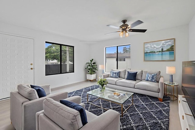 3458 Los Mochis Way, Oceanside, CA 92056 - living area featuring wood finished floors and a ceiling fan
