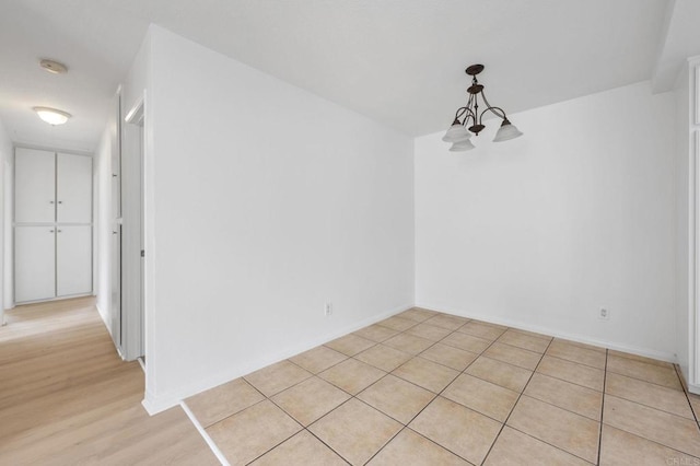 3458 Los Mochis Way, Oceanside, CA 92056 - unfurnished dining area with a chandelier and baseboards