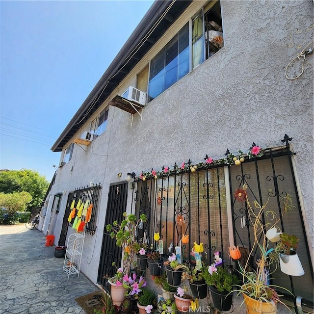 3322 E 8th St, Los Angeles, CA 90023 - view of home's exterior with stucco siding