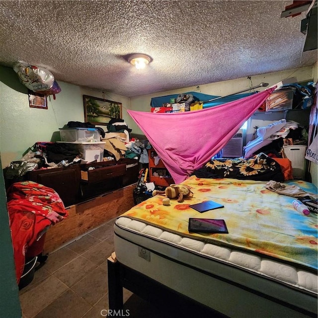 3322 E 8th St, Los Angeles, CA 90023 - tiled bedroom with a textured ceiling